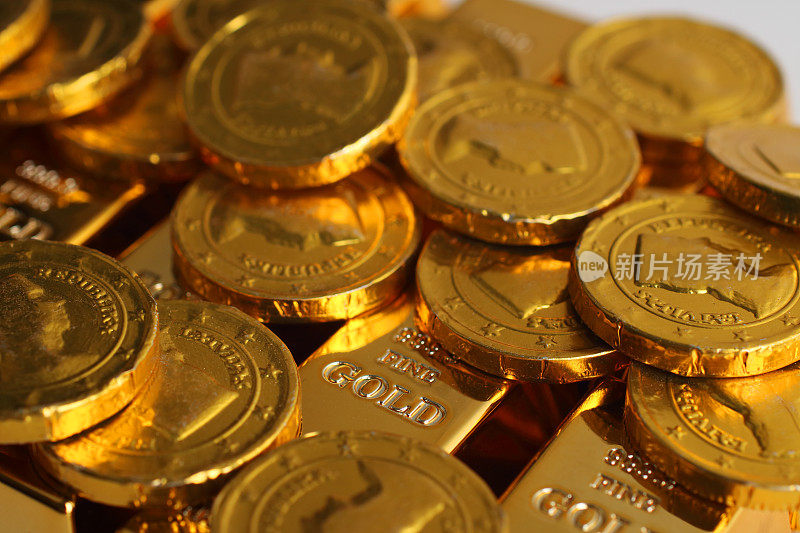 Gold coins with gold ingot